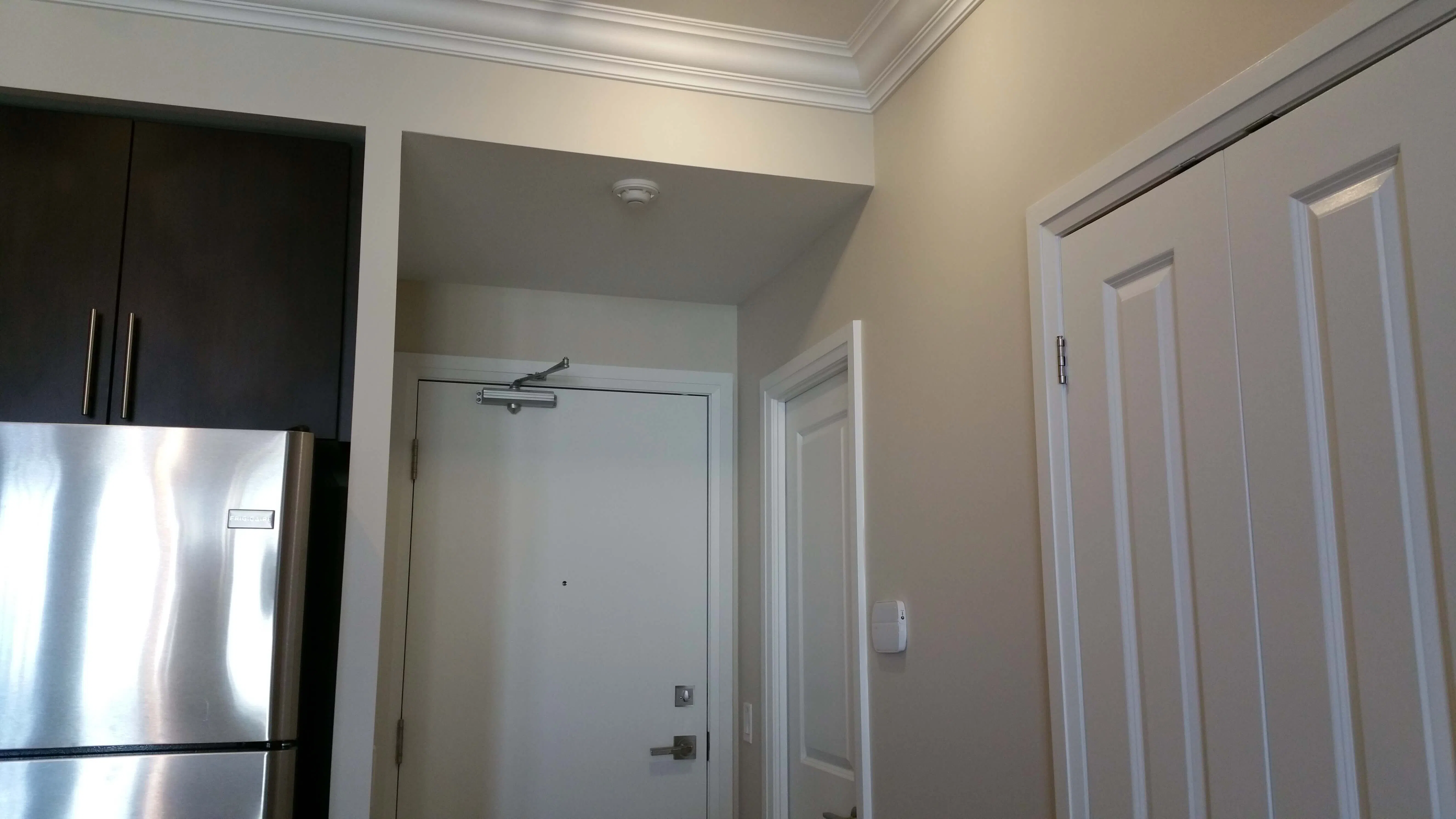 Painting Laminate vs Wood Cabinets (Condo Guide)